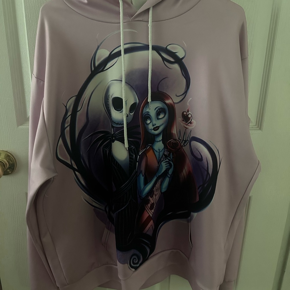 Purple Skull Design Sweater with Ethereal Elements
